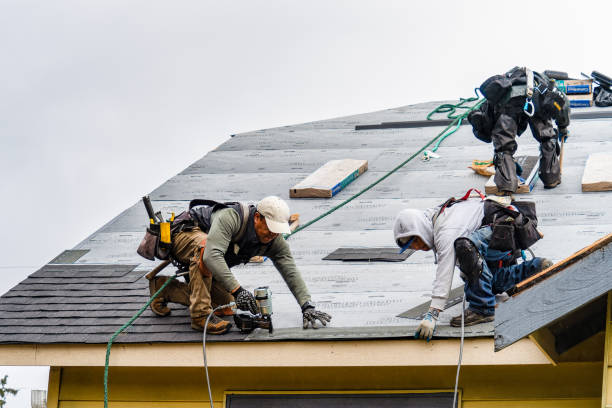 Professional Roof Replacement technician working in Teterboro, NJ